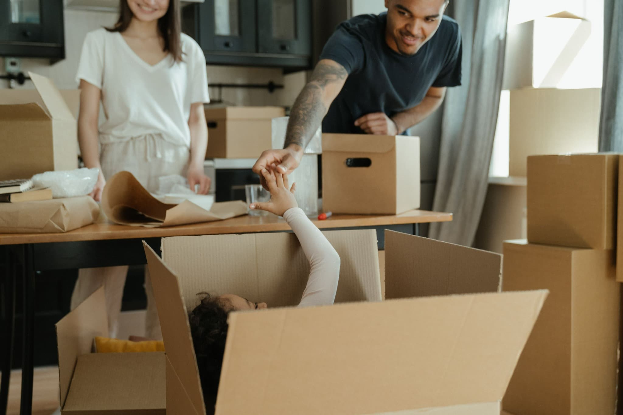 A family unpacking together after a move